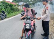 Jaga Kondusifitas Lalu Lintas, Polsek Totikum Gelar Strong Point dan Patroli Dialogis di Sambiut